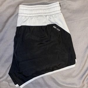 Juniors Nike Dri-Fit Athletic Shorts. Black with silver lining.